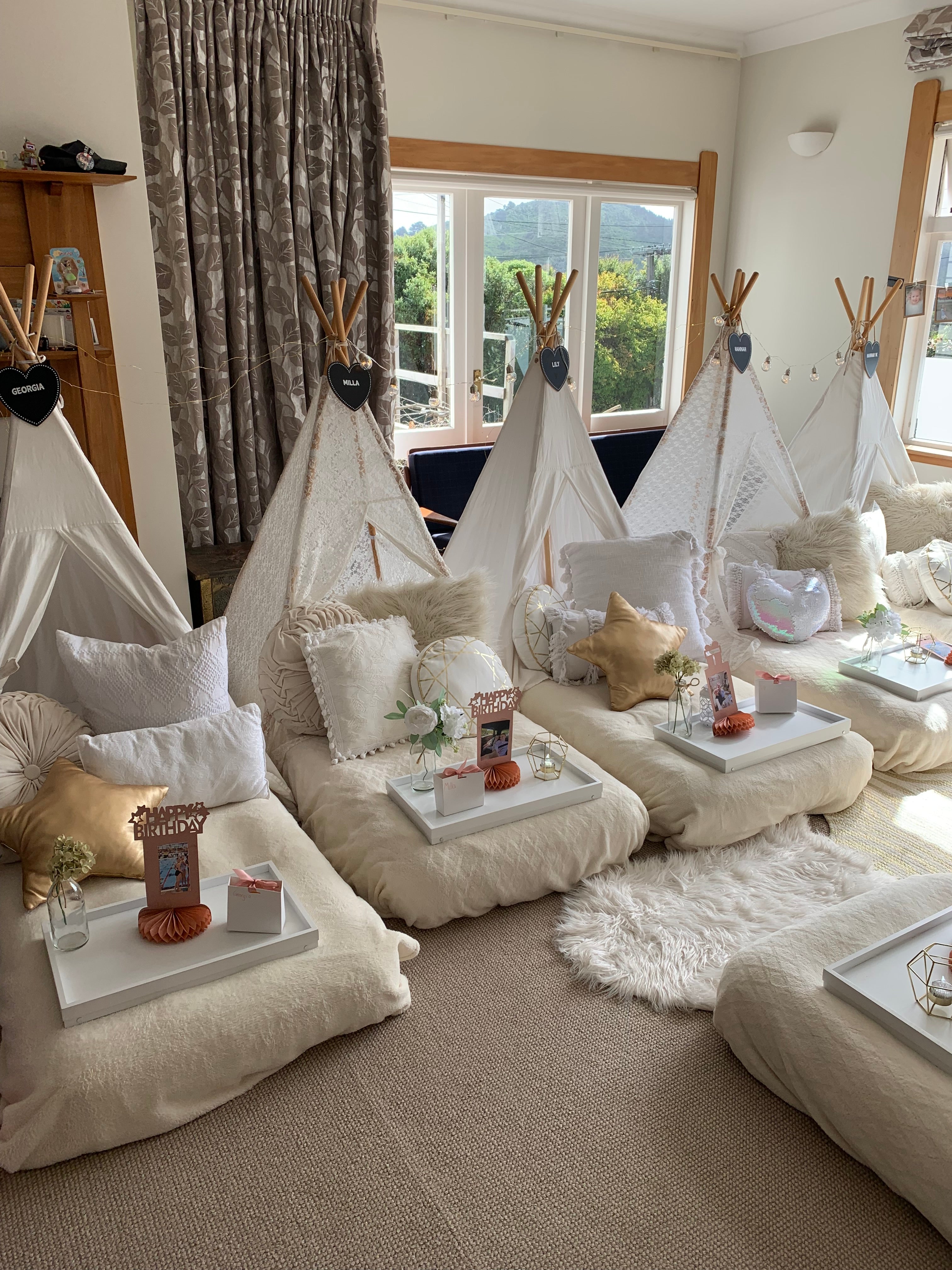 White and gold themed teepee party setup Wellington
