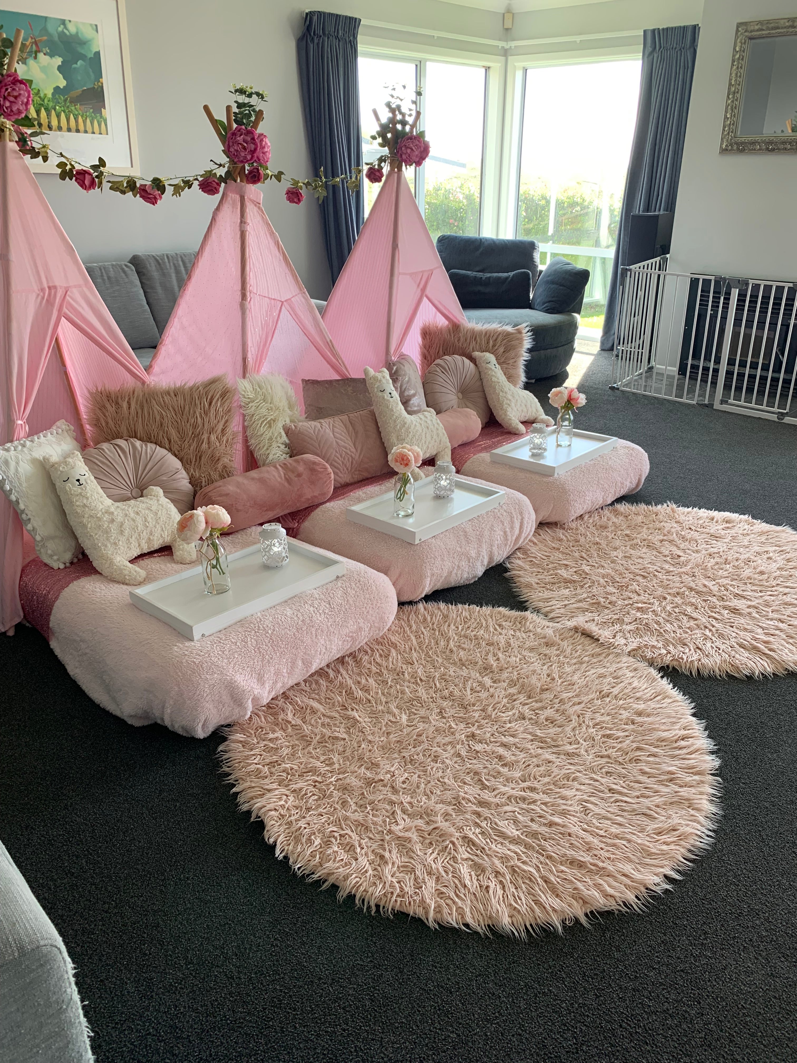 Pink blooming floral teepee party with llamas Wellington