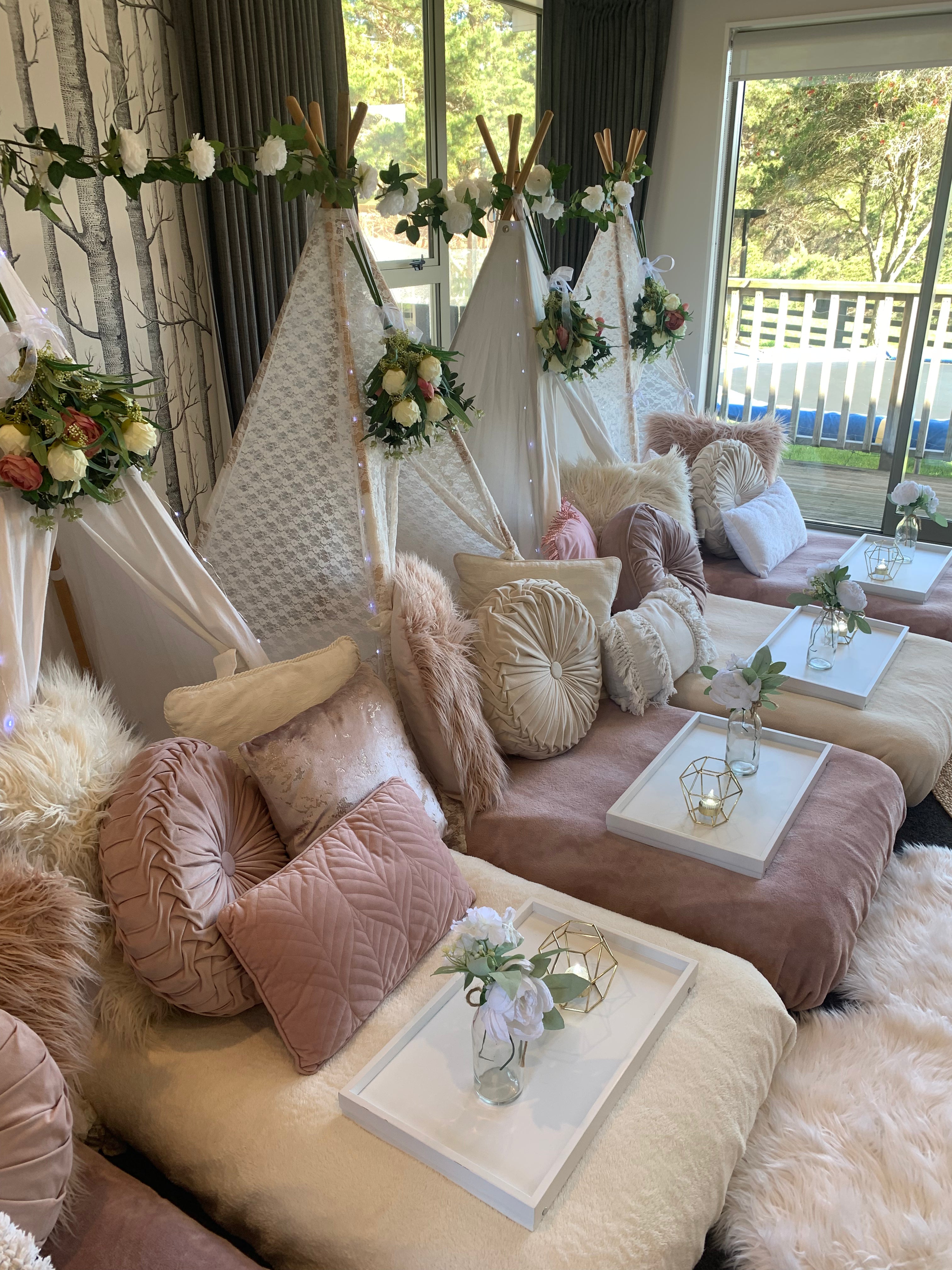 Blooming floral white and blush pink teepee setup Wellington