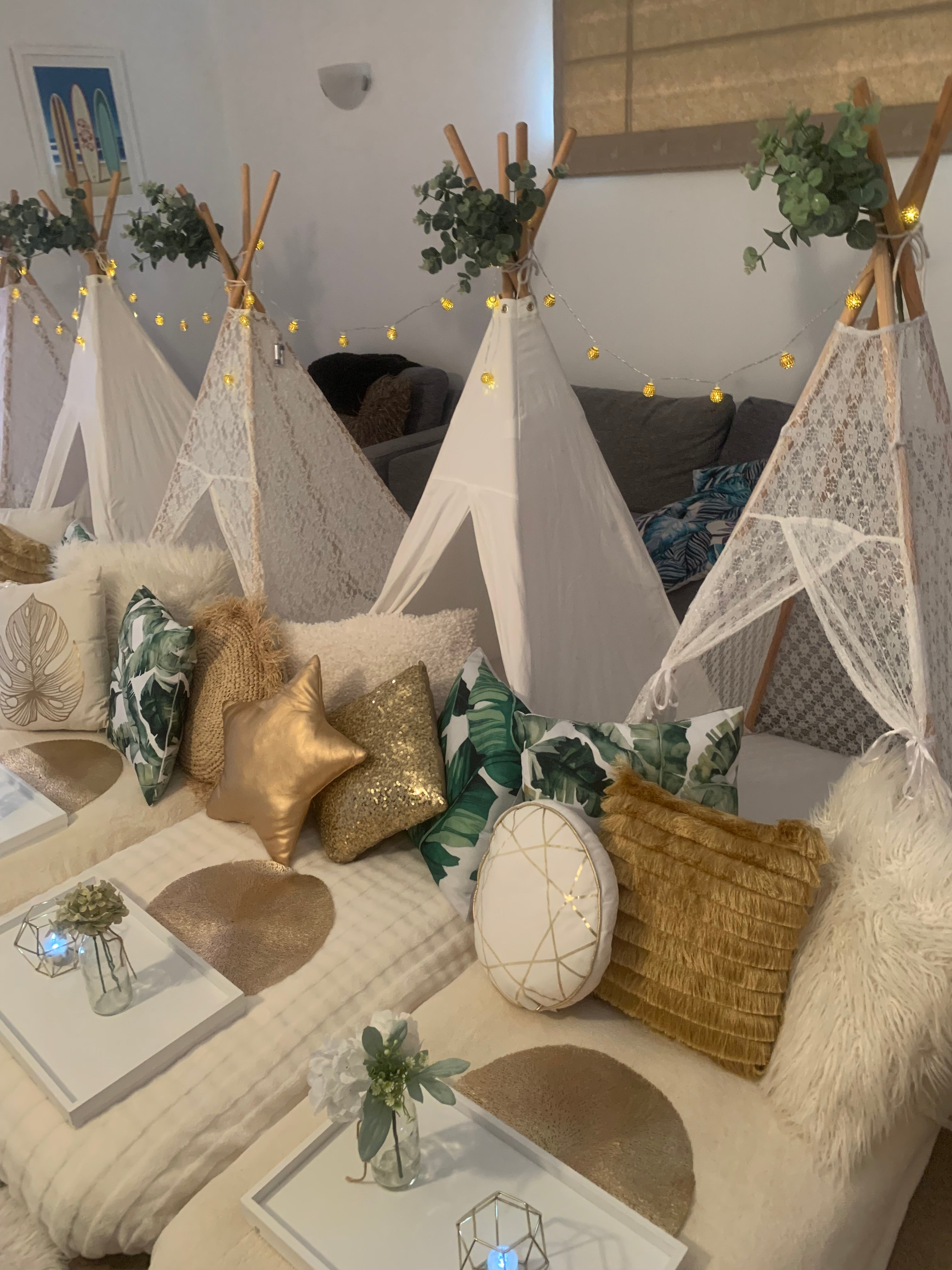 Cream, gold and a touch of eucalyptus leaves for a wonderful Wellington teepee slumber party