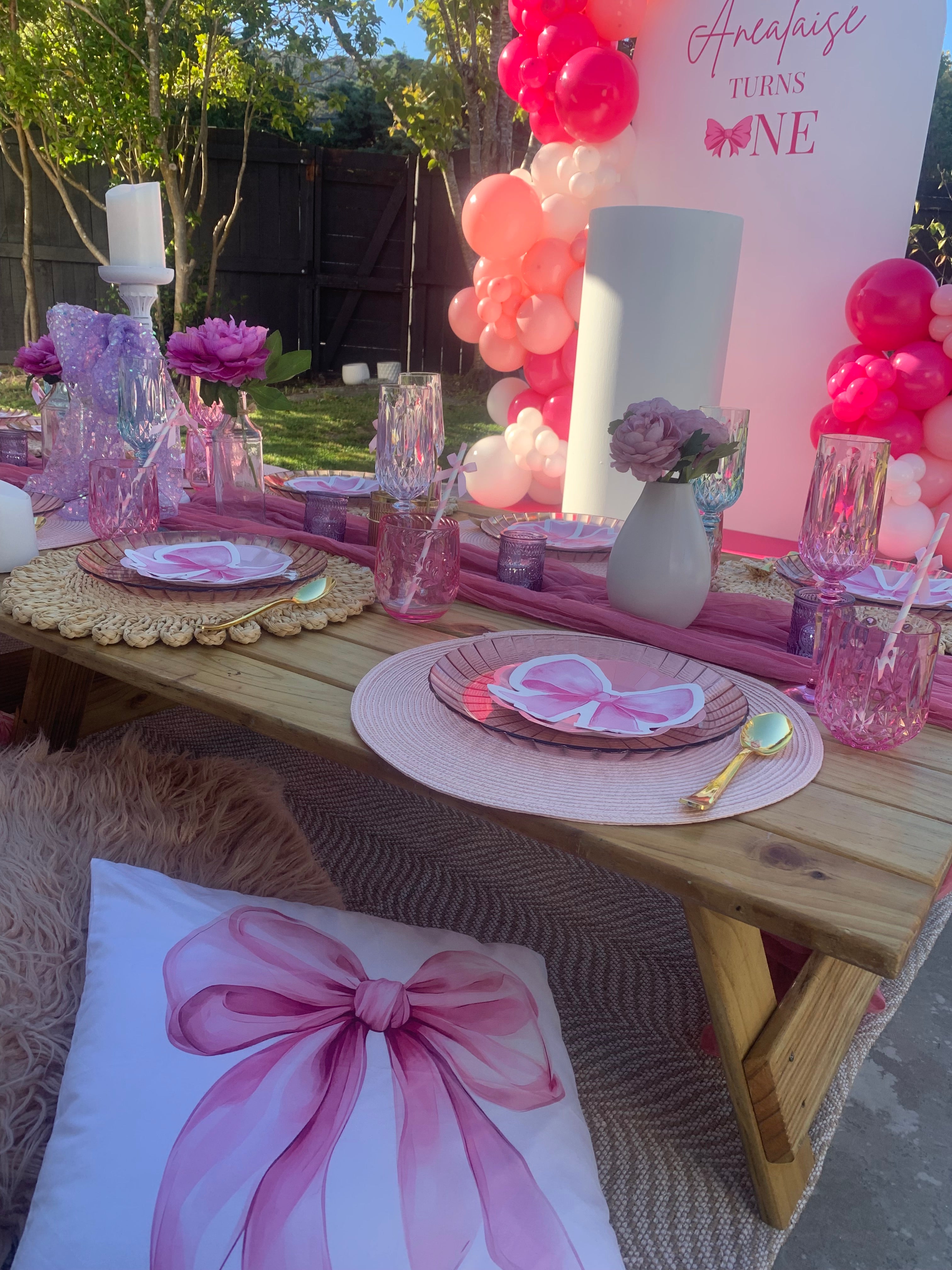 Wellington pretty picnic setup with pink bows