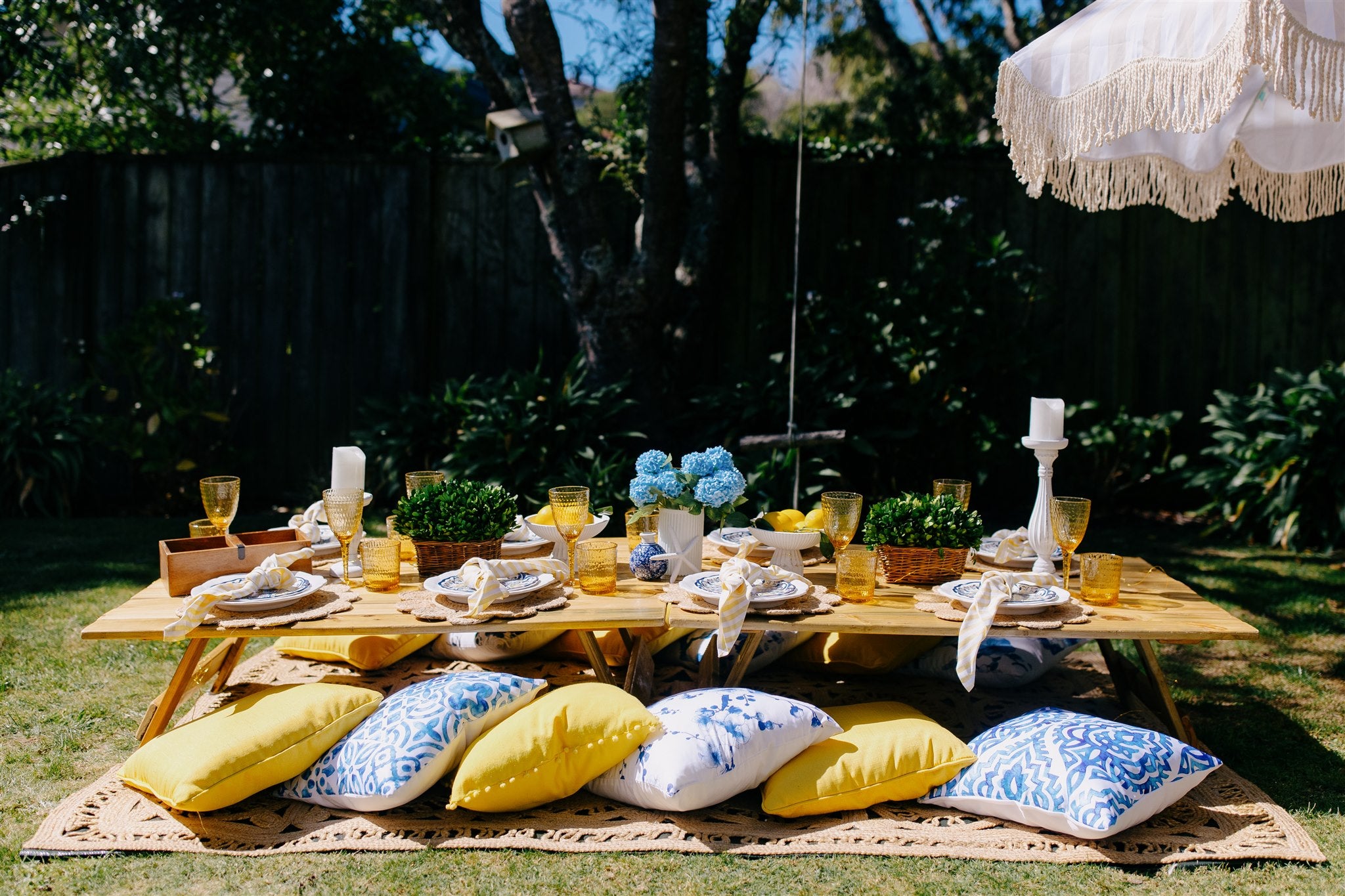 Coastal yellow and blue pretty picnic tablescape Wellington
